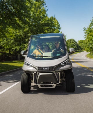 cru driving on road front view 320x390 1